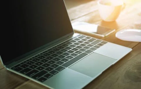 Laptop on work table. Stock Photos