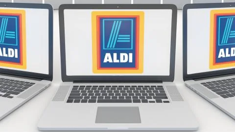 Laptops with Aldi logo on the screen. Computer technology conceptual editorial Illustrazione stock