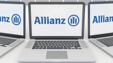 Laptops with Allianz logo on the screen. Computer technology conceptual Illustrazione stock