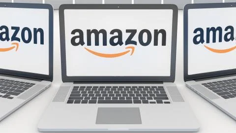 Laptops with Amazon.com logo on the screen. Computer technology conceptual Stock-Illustration