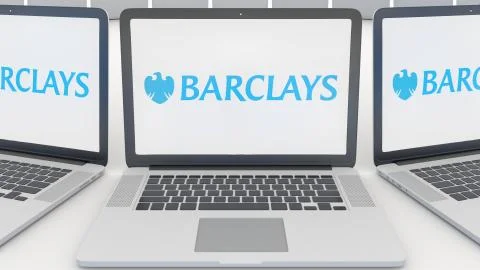 Laptops with Barclays logo on the screen. Computer technology conceptual Illustrazione stock