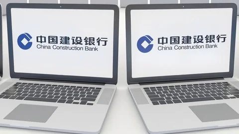 Laptops with China Construction Bank logo on the screen. Computer technology Stock Footage