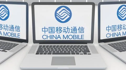 Laptops with China Mobile logo on the screen. Computer technology conceptual Illustrazione stock