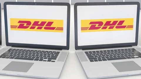 Laptops with DHL Express logo on the scr... | Stock Video | Pond5