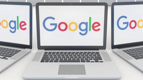 Laptops with Google logo on the screen. Computer technology conceptual editorial Illustrazione stock
