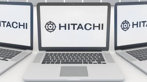 Laptops with Hitachi logo on the screen. Computer technology conceptual Illustrazione stock