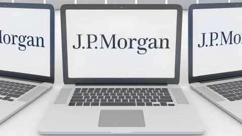 Laptops with J.P. Morgan logo on the screen. Computer technology conceptual Stock-Illustration