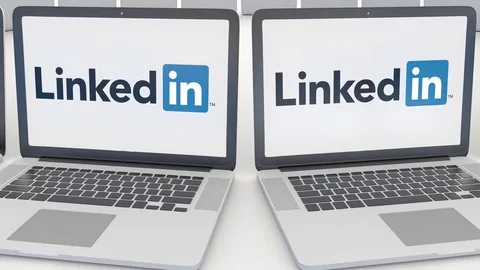 Laptops with LinkedIn logo on the screen. Computer technology conceptual Stock Footage 73122036