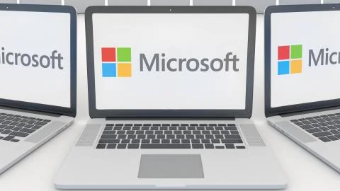 Laptops with Microsoft logo on the screen. Computer technology conceptual イラスト素材