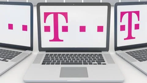 Laptops with T-Mobile logo on the screen. Computer technology conceptual Illustrazione stock