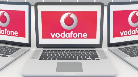 Laptops with Vodafone logo on the screen. Computer technology conceptual Stock-Illustration