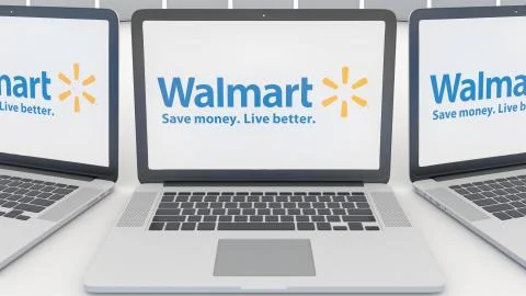 Laptops with Walmart logo on the screen. Computer technology conceptual Stock-Illustration