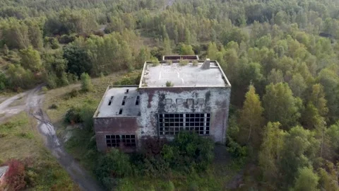 Large abandoned building in a closed coal mine in Kent dolly forward 動画素材 162910661