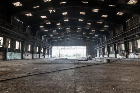 Large abandoned hangar Stock Photos