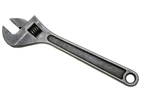Large adjustable wrench on a white background. Insulated object. Old worn too Stock Photos