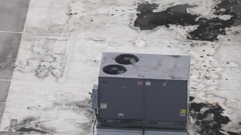 Large air conditioning unit on an urban rooftop Stock Footage 296220964
