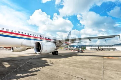Large airliners docked at the airport Stock Photos