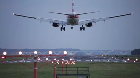 Large airplane landing at night in DCA Reagan National Airport Washington DC Stock Footage 65218375