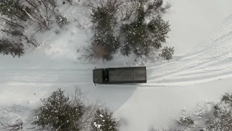 The large all-terrain vehicle Ural is moving in reverse, preparing to cross the Stock Footage 170921748