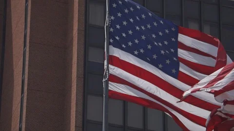 Large American Flag Blowing Slow Motion Strong Wind (120 FPS) Stock Footage