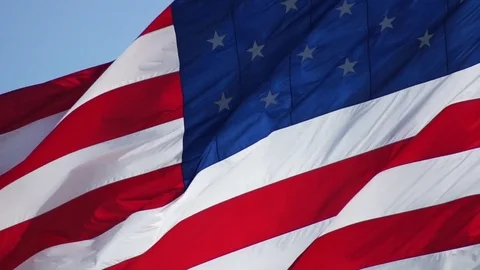 Large American Flag Close Up Slow Motion Waving in Wind Stock Footage 77610214