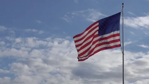 Large American Flag Waving in the Wind Stock Footage 80844616