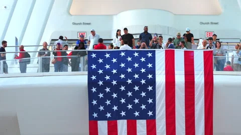 Large American Flags hung on the Oculus at World Trade Center Transportation Hub Stock Footage 284586105