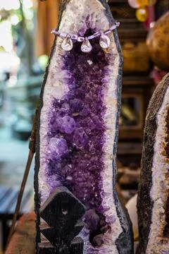 Large Amethyst crystal geode. Raw rough purple gemstone. Selective Focus. Stock Photos