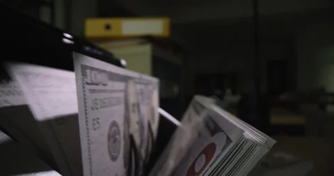 Large amount of money counting in machine in bank closeup 4k movie slow motion Vídeos de archivo 264949421