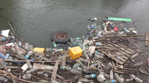 Large amount of plastic glass bottles waste and pollution dance with a tire Видео 295851032