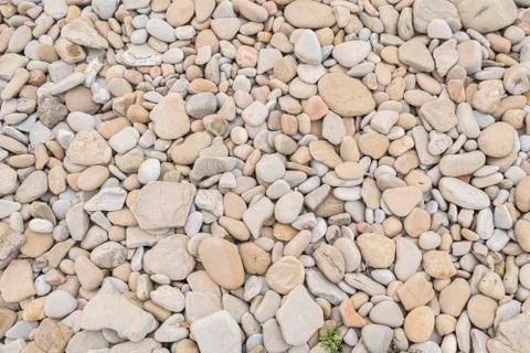 Large amount rounded and polished beach rocks Stock Photos