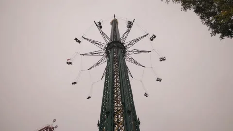 Large and high chairoplane carousel, high up in the air Prater, Vienna Stock Footage 165343150