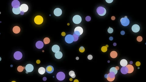 Large and small moving colored particles in the dark Vídeos de archivo 321955661