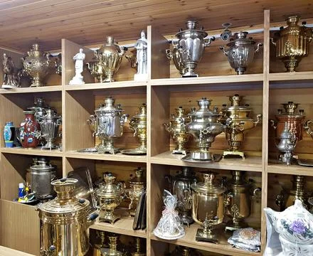 Large and small samovars in the roadside shop of the Russian highway Pskov No Stock Photos