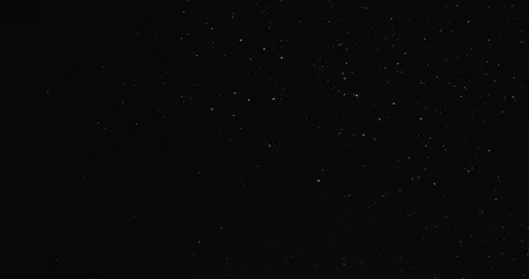 Large and small snow snowflakes winter holiday christmas against black Vídeo Stock 104346053