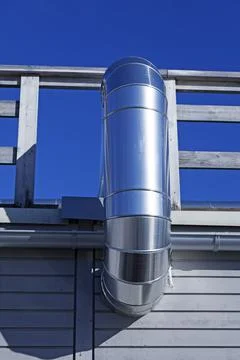 Large and thick ventilation pipe on roof Foto stock