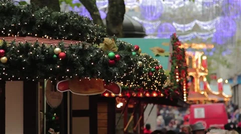 Large Anonymous Crowd Walk Past Out of Focus German Market Christmas Lights 動画素材 44514394