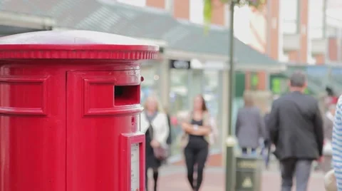 Large Anonymous Crowd Walking Passed Red Letter Box Stock-Footage 42906849