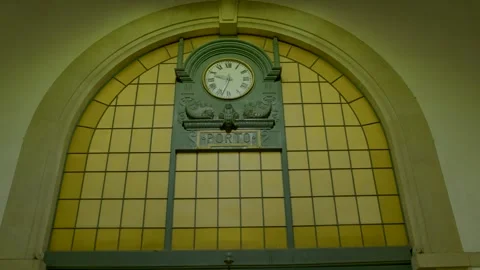 Large arched clock window in historic building Stock Footage 327688609