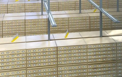 Large archive interior filled with stacked wooden card catalog cabinets arr.. Stockfoto's