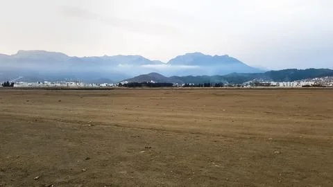 A large area of soil that is devoid of grass Stock Photos