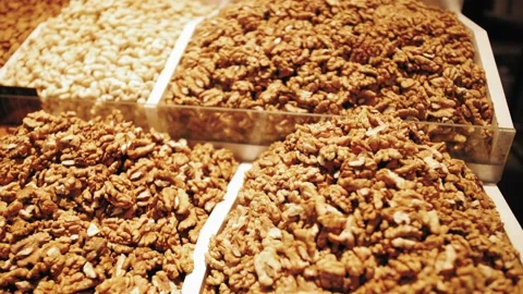 Large assortment of nuts on the counter. Close-up of nuts 스톡 동영상 139818121