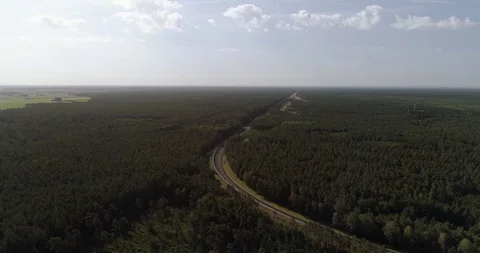 Large banked secret vehicle test facility in forest, Germany drone aerial 4k Stock Footage 124647495