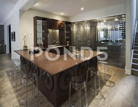 Large bar and wine cellar in contemporary home Stock Photos
