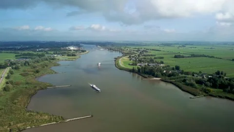Large barge in the netherlands on the river Lek Stock Footage 163100836