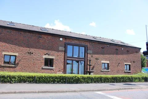 Large barn conversion with diamond formation air vents intact Foto stock