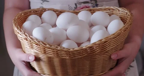 Large basket with chicken eggs Stock Footage 141096796