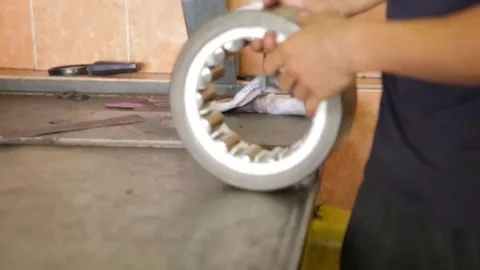 Large bearings from the train in hand Stock Footage 80452850