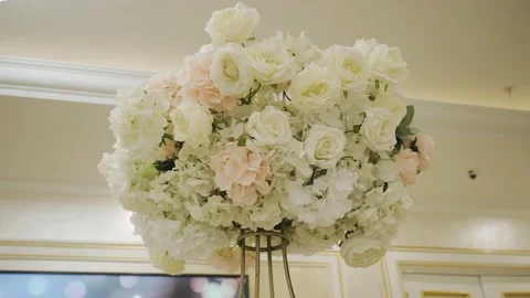 A large beautiful bouquet decorates the table in the room Stock Footage 163900906