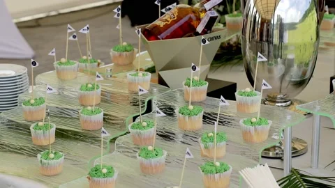 A large, beautiful, bright buffet with many alcoholic drinks, sweet snacks, a 動画素材 142880420